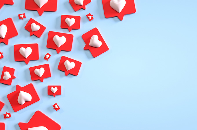 conos de Likes Esparcidos Sobre Fondo Celeste, Simbolizando a los Nanoinfluencers