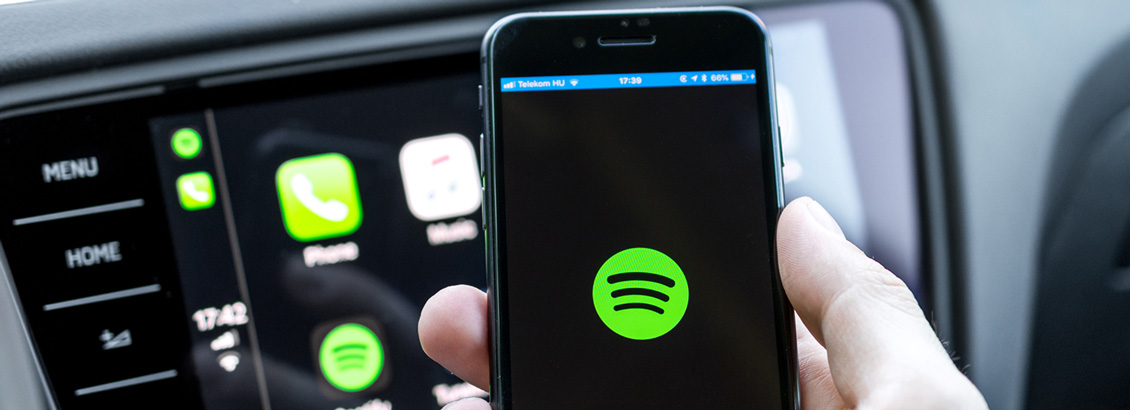 Pantallas de Celular y Tablet con Logo y Listados de Spotify