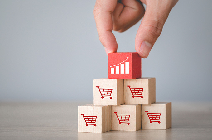 Torre de Cubos con Signo de Ecommerce que Representa Ventas en Instagram